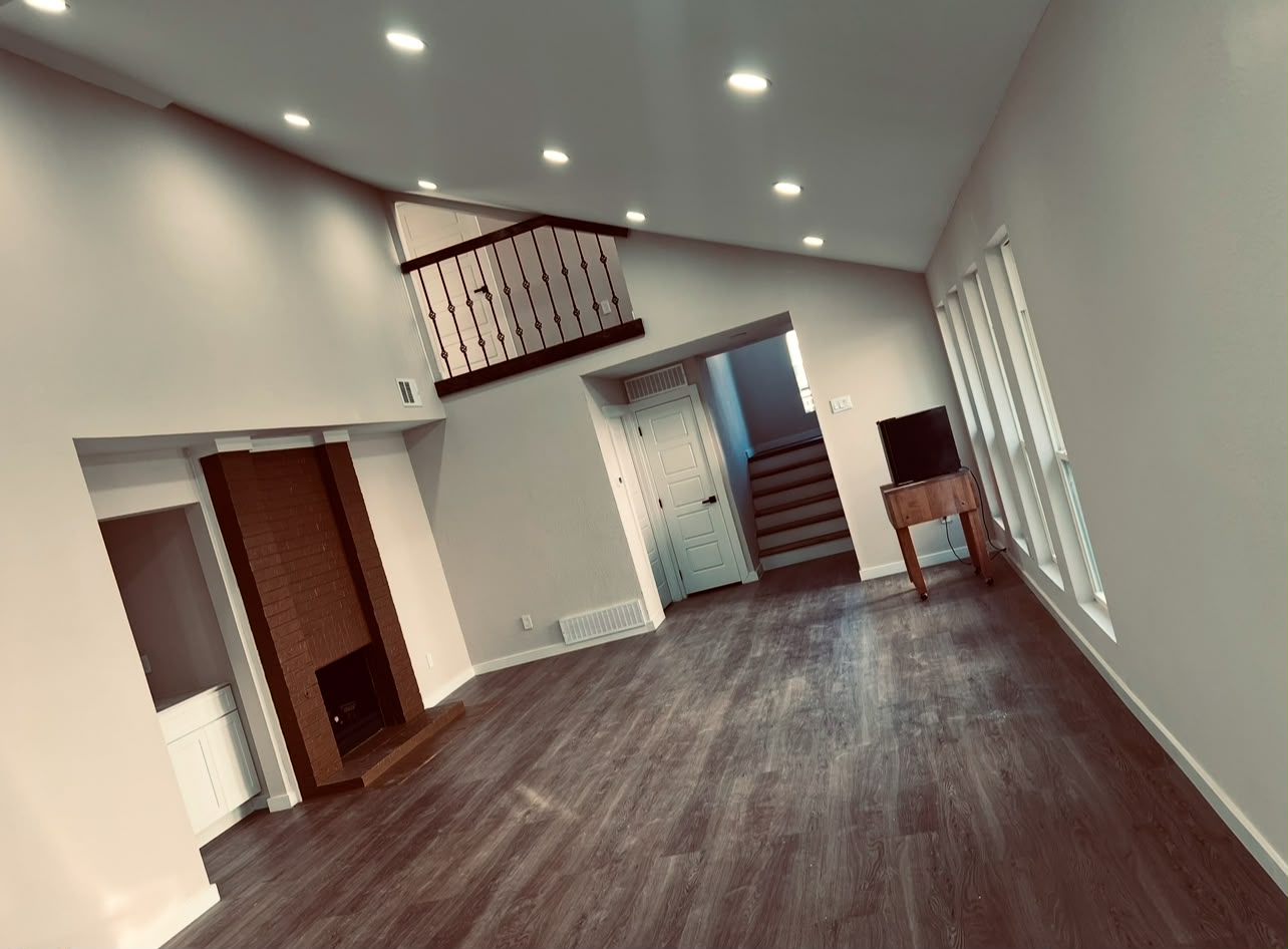 Remodeled living room with new recessed lighting
